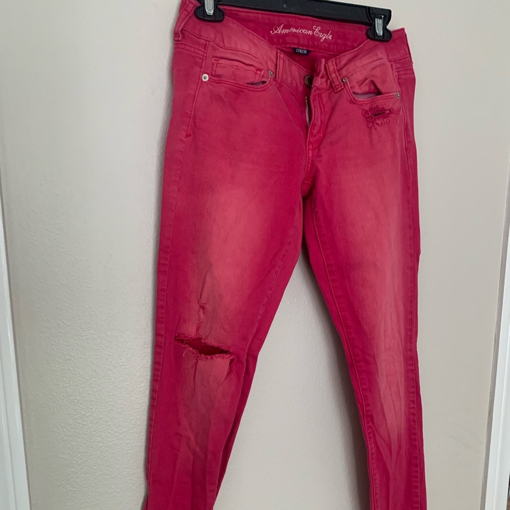 Pink distressed skinny jeans - American eagle